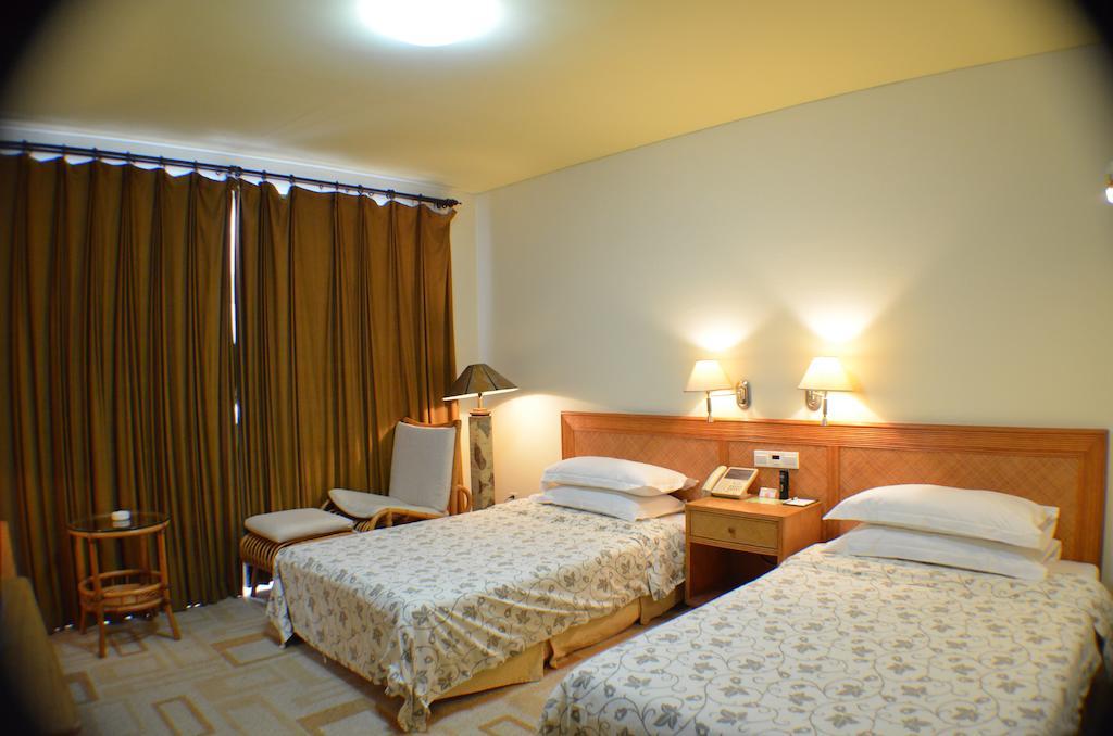 Rghcm Garden Resorts Peking Rum bild